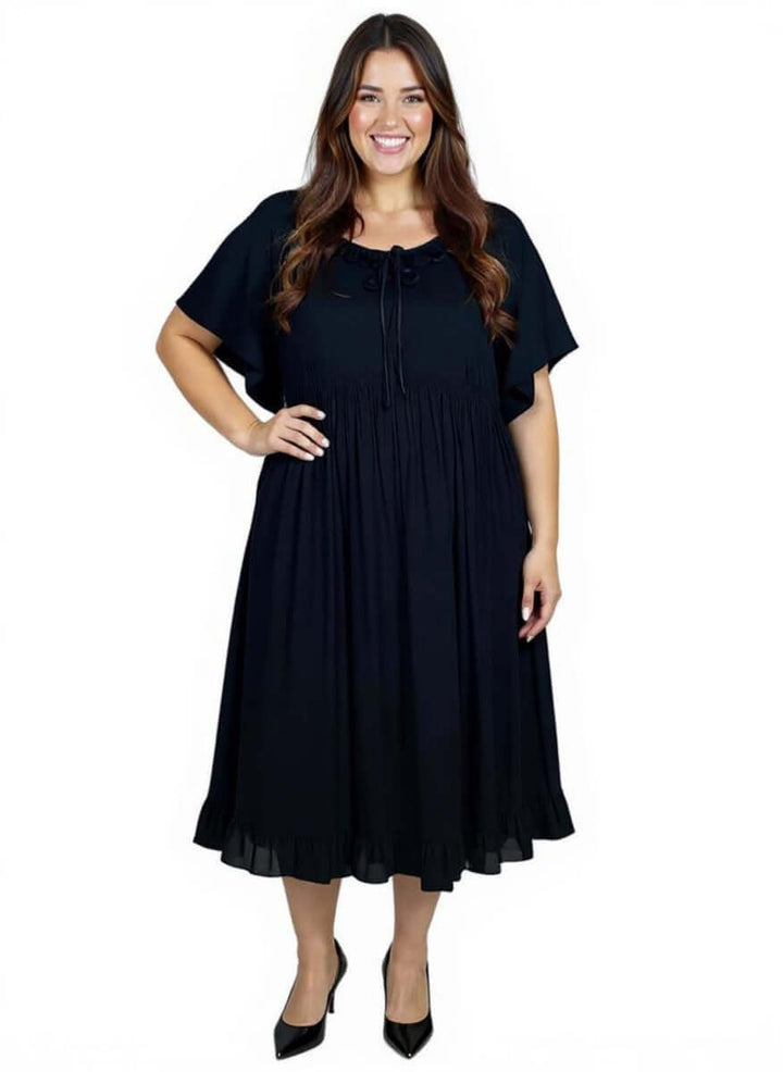 Dale and Waters Women’s Plus Size Trinity Dress in Black with pleated ruffle and tie detail for vintage charm.