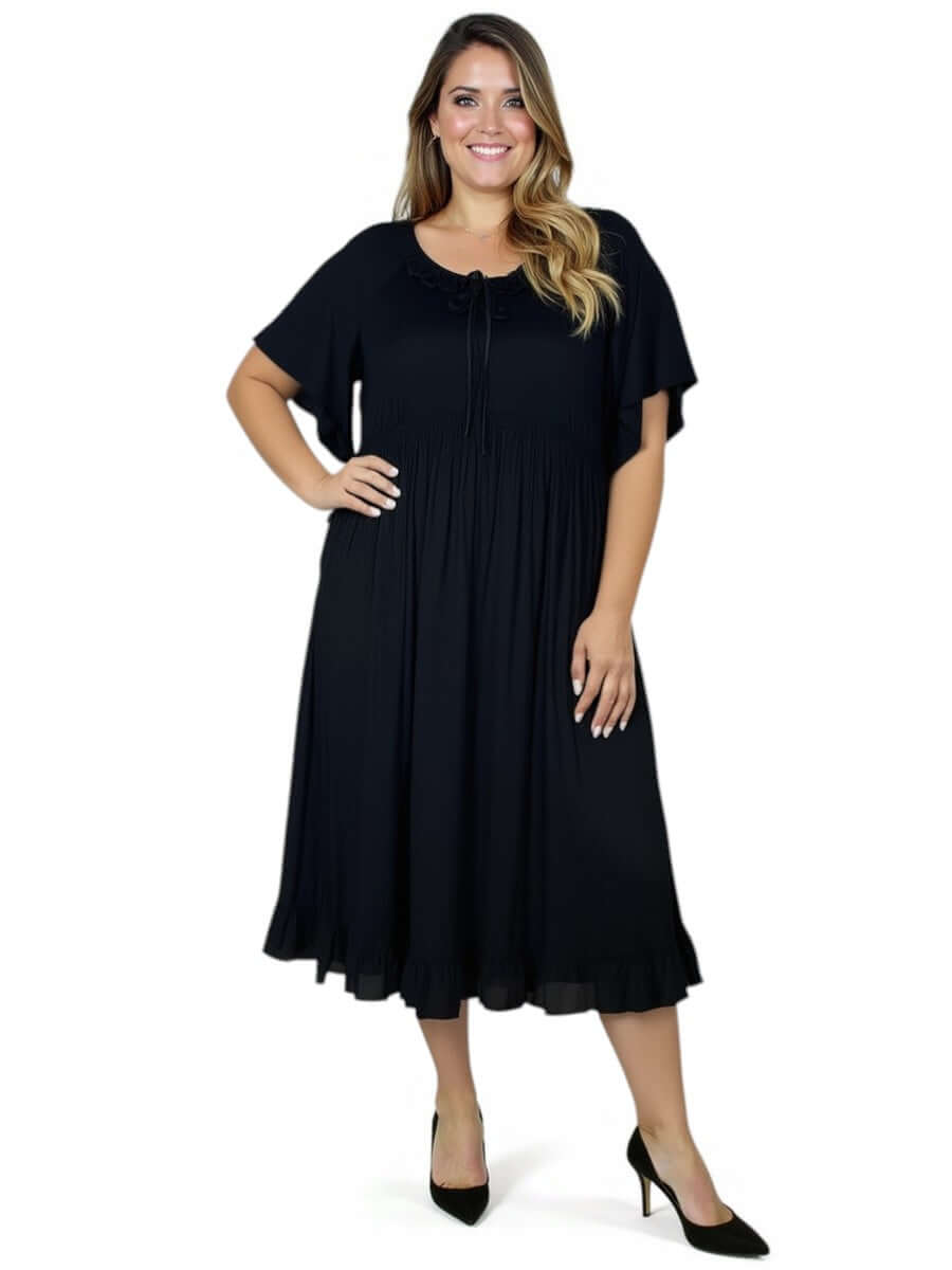 Women’s Plus Size Trinity Dress in Black by Dale and Waters, featuring a round neckline and relaxed fit.