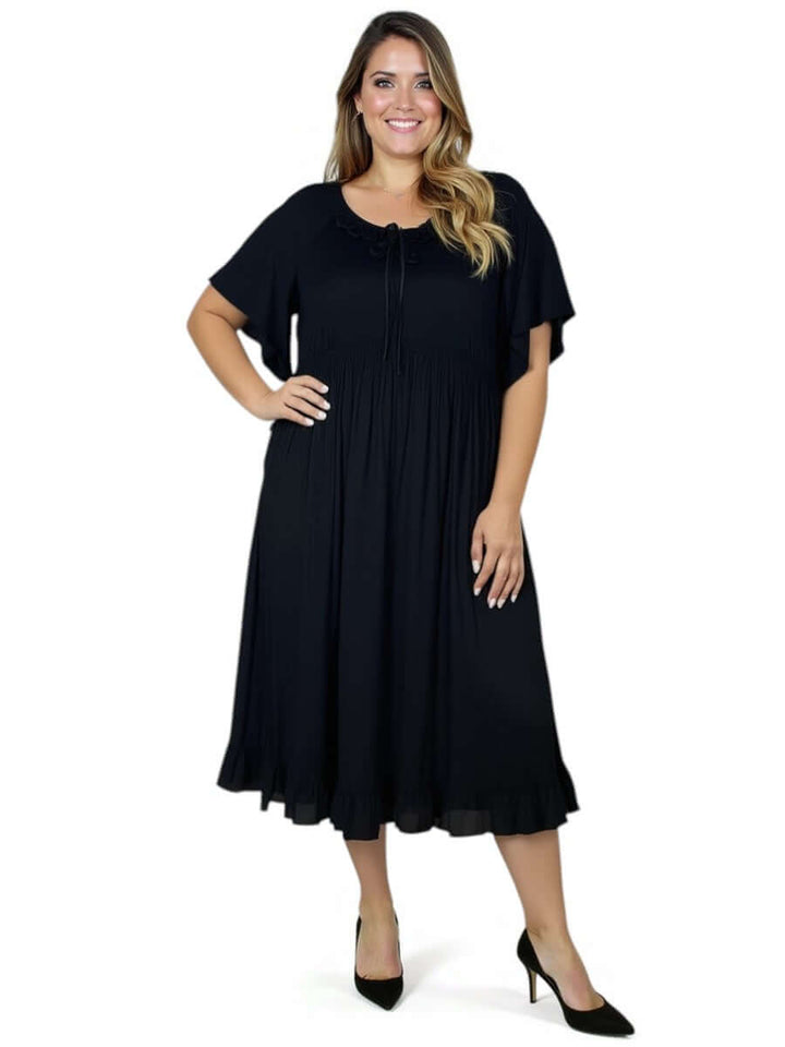 Women’s Plus Size Trinity Dress in Black by Dale and Waters, featuring a round neckline and relaxed fit.