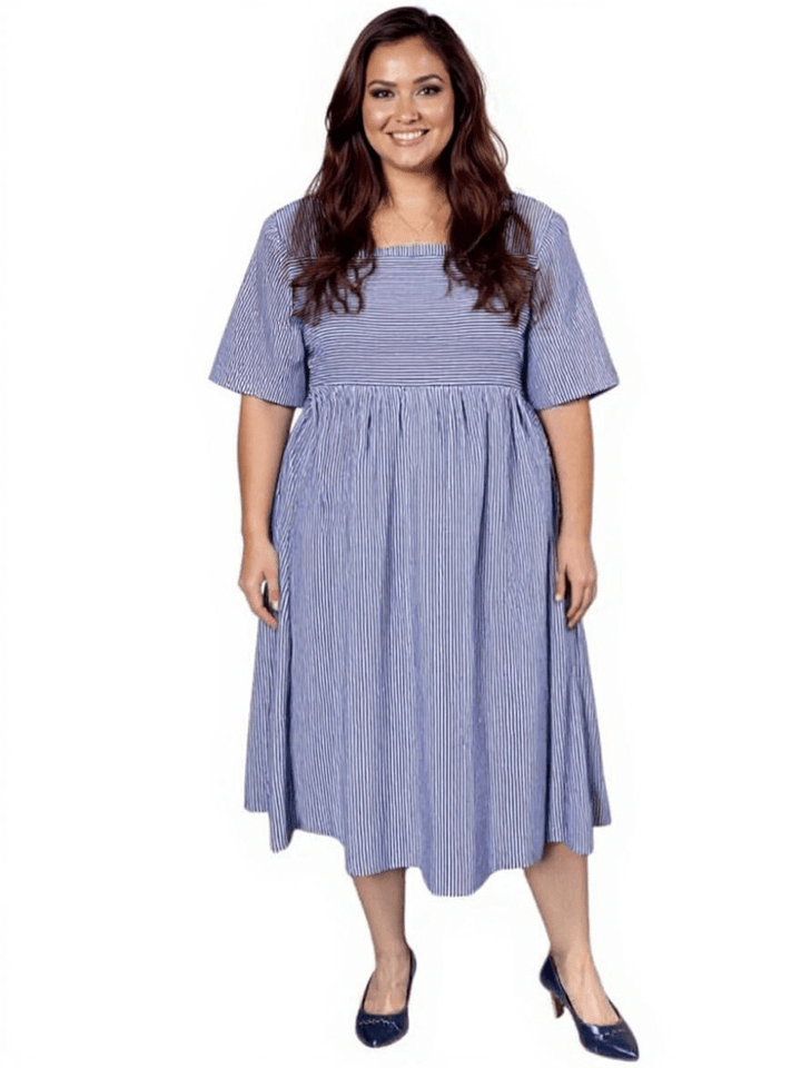 Women’s Plus Size August Dress – Blue Print by Dale and Waters, featuring a square neckline and flowy babydoll silhouette.