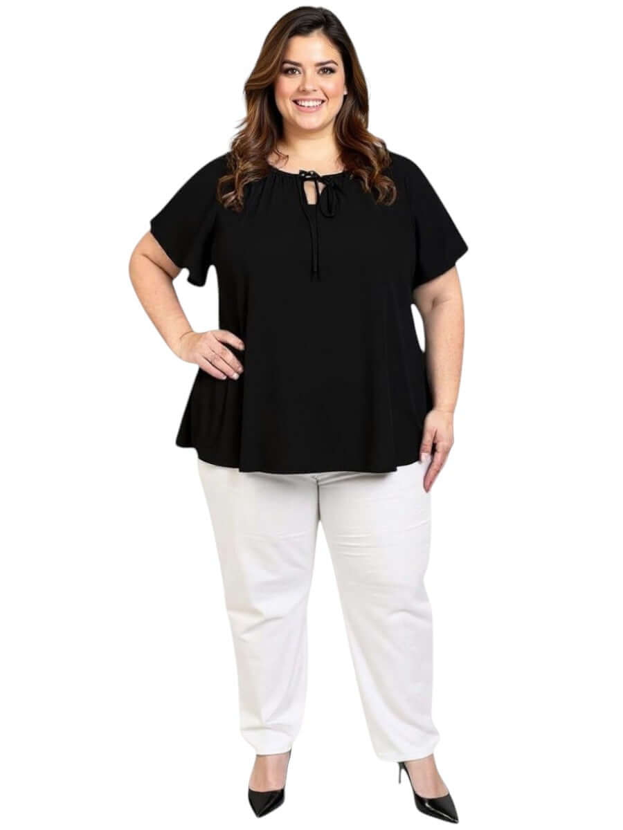 Women’s Plus Size Yasmin Top in black by Dale and Waters, featuring V-neck, keyhole tie, and flutter sleeves.