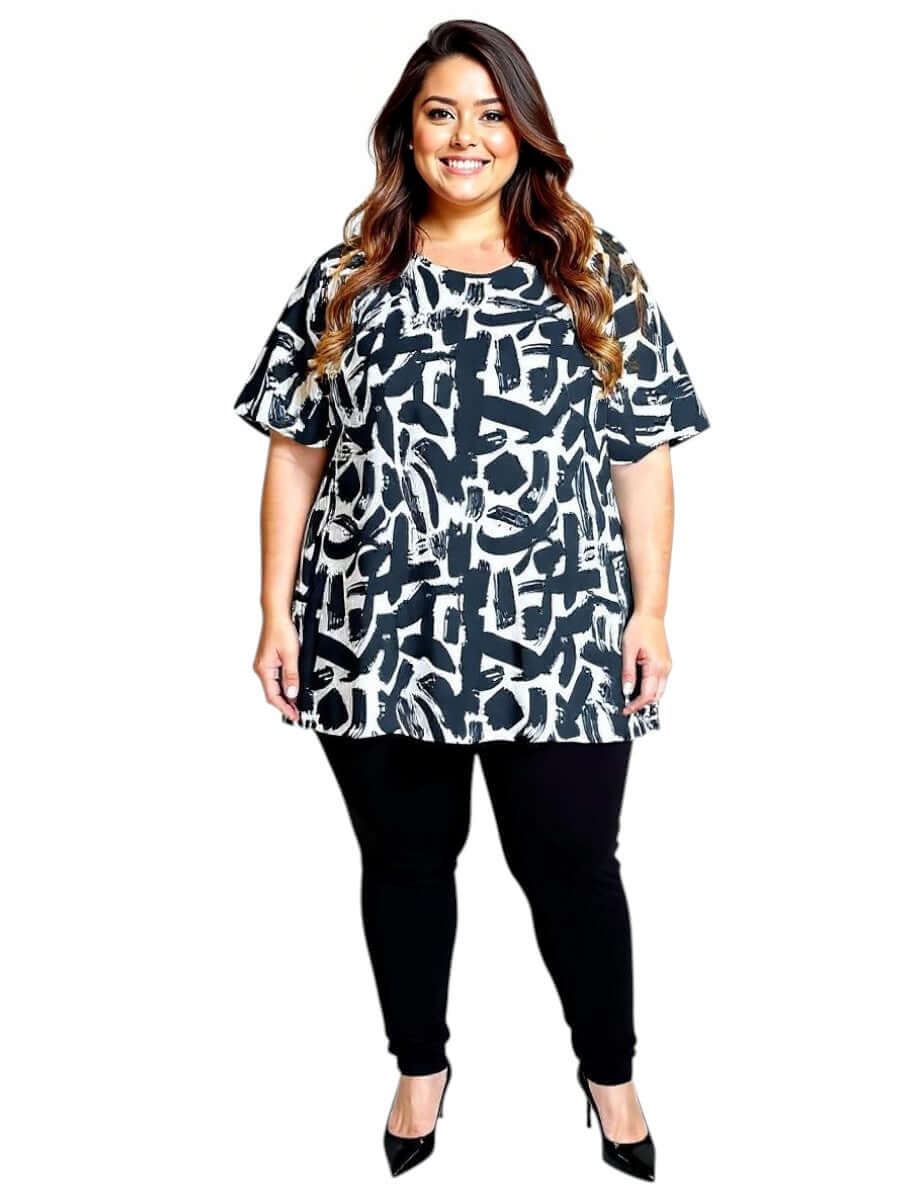 Plus size model wearing the Women’s Plus Size Johanna Top in Black and Cream Print by Dale and Waters.