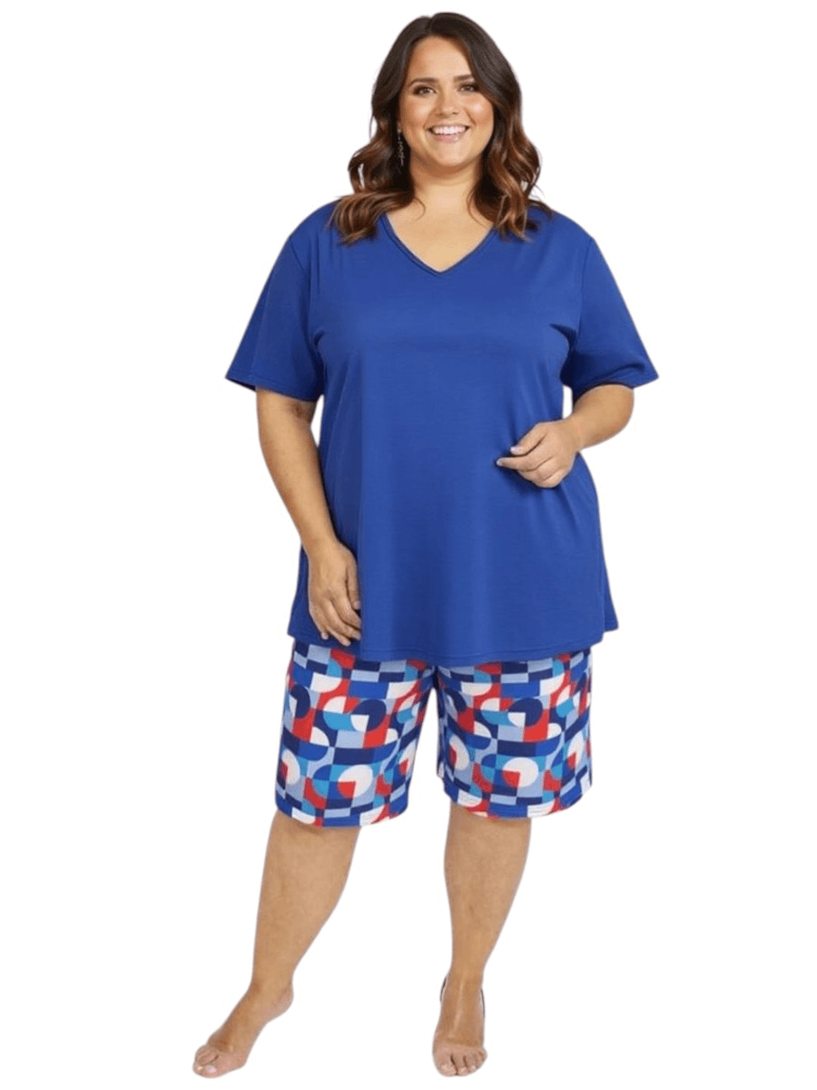 Women’s Plus Size Deep Sea Swim Rashi by Dale and Waters in blue, featuring V-neck and colorful shorts.