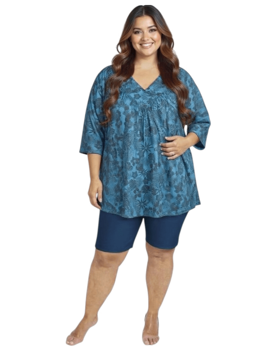 Women’s Plus Size Shadow Tropics Swim Rashi - Teal Print by Dale and Waters, featuring V-neck and ¾ sleeves, ideal for swim days.