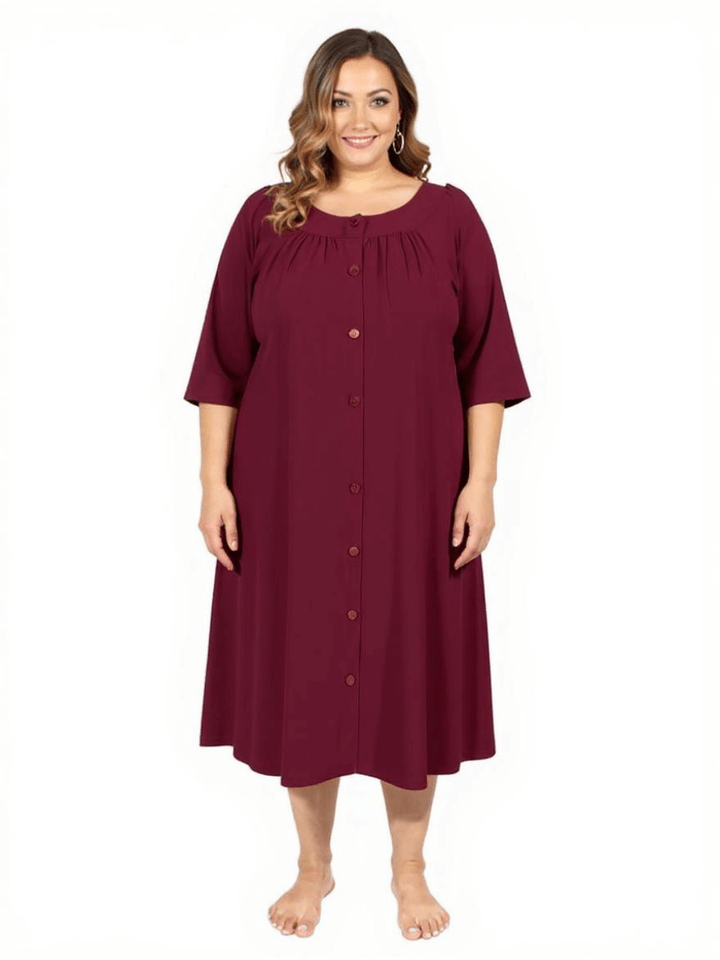 Women’s Plus Size Spring Dressing Gown in Wine by Dale and Waters with button-through front and ¾ sleeves.