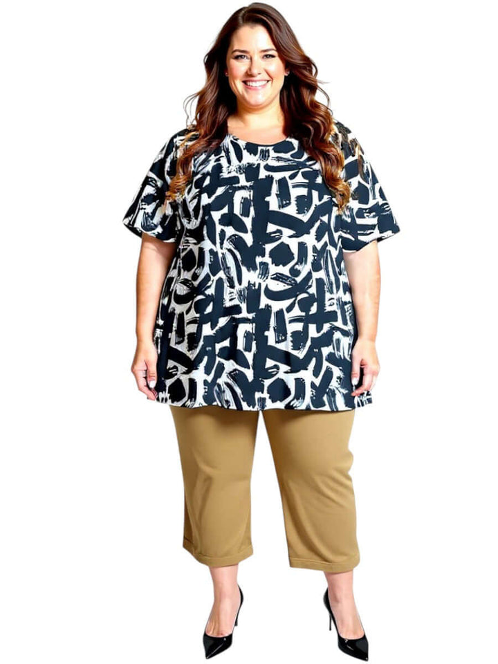 Woman wearing Love Is In The Air Pants - Coco Truffle with a stylish top, showcasing plus size fashion for sizes 16-50.