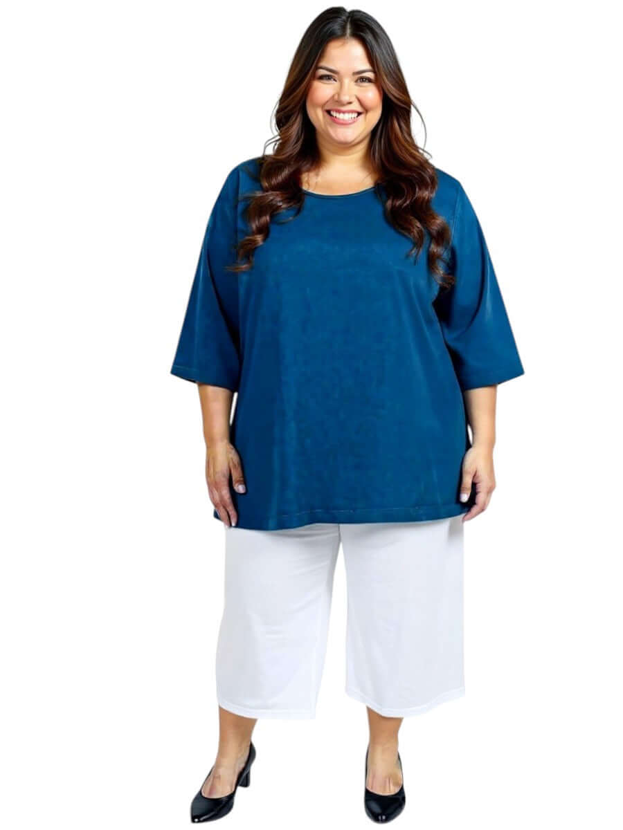 Woman in navy top and white Love Is In The Air Pants - White, plus size fashion from Dale & Waters for sizes 16-50.