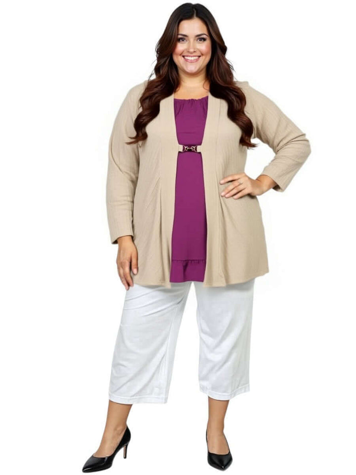 Woman wearing Love Is In The Air Pants - White with a beige cardigan and purple top, showcasing plus size style.