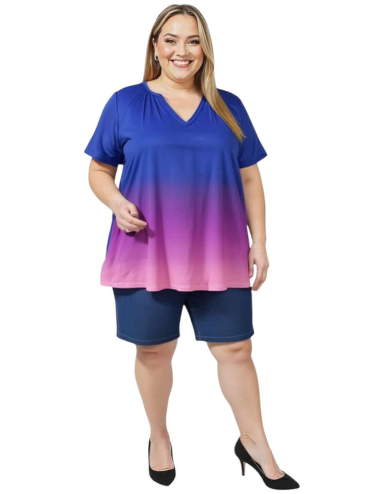 Women’s Plus Size Denim Shorts - Denim paired with a colorful top for casual summer style.