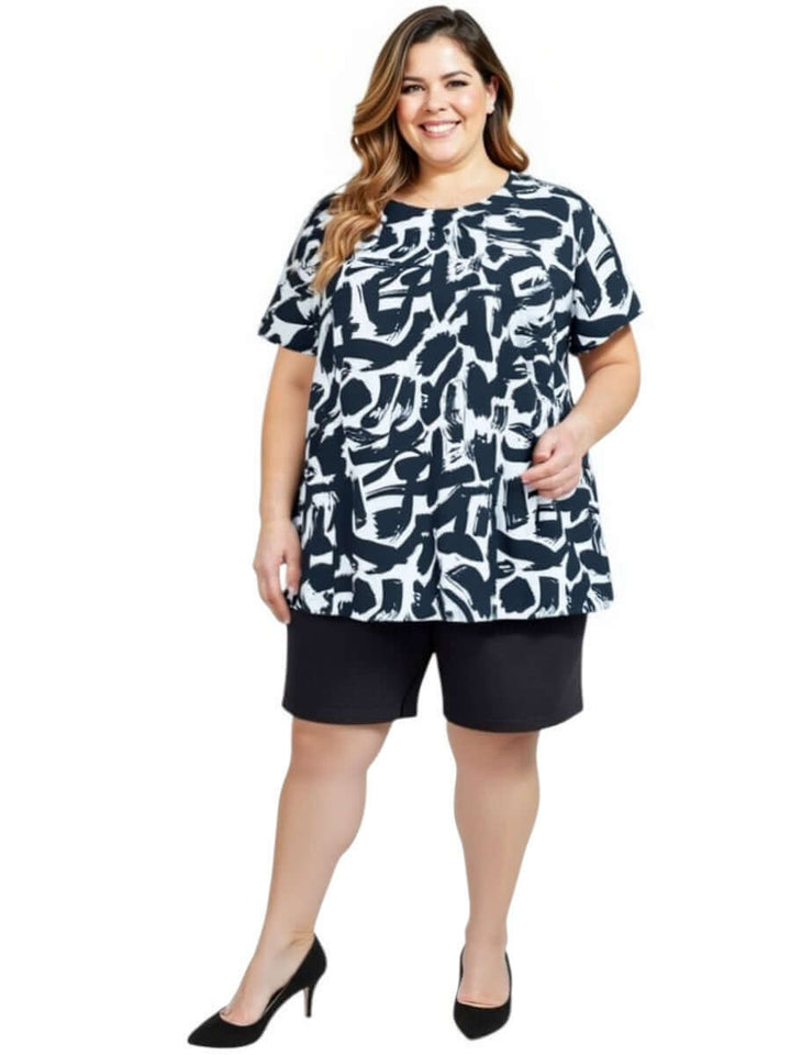 Plus size model wearing Denim Shorts - Black and abstract printed top, showcasing comfort and style.