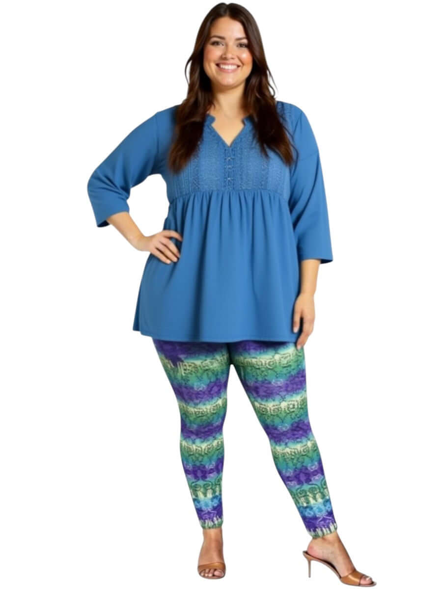 Model wearing Atlas Leggings - Purple Print with blue top, showcasing plus size style for women size 16-50.