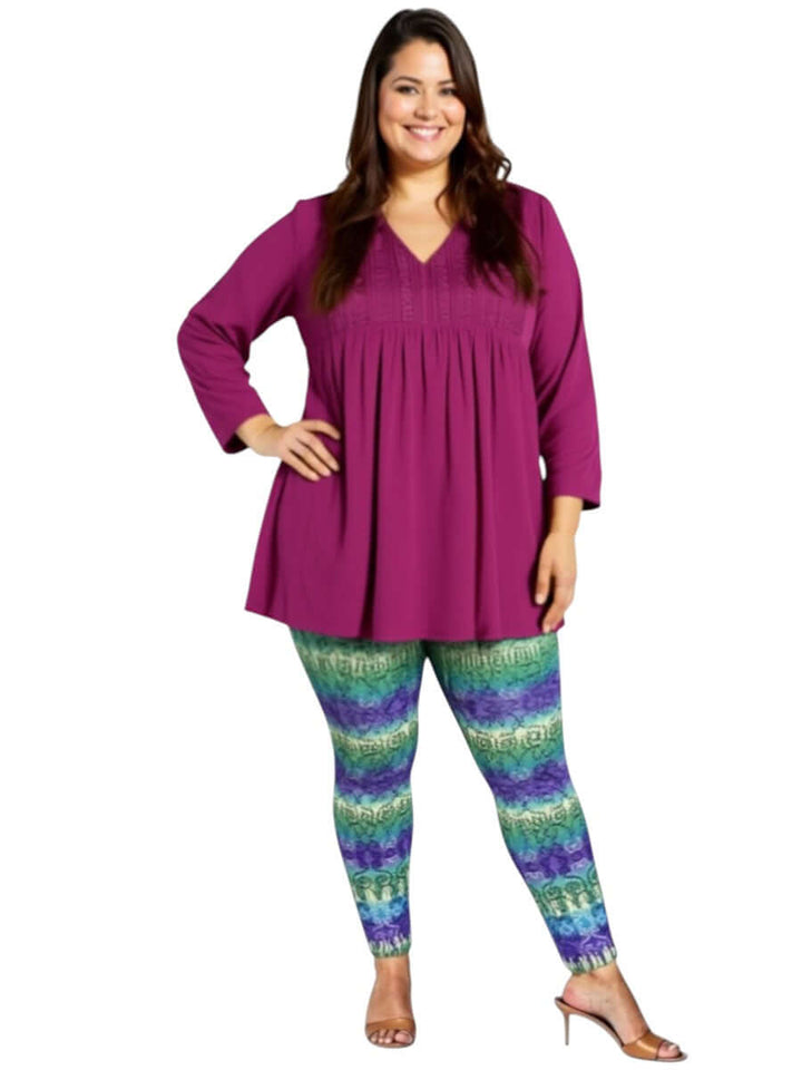Atlas Leggings - Purple Print on a plus size model showcasing effortless style and comfort.