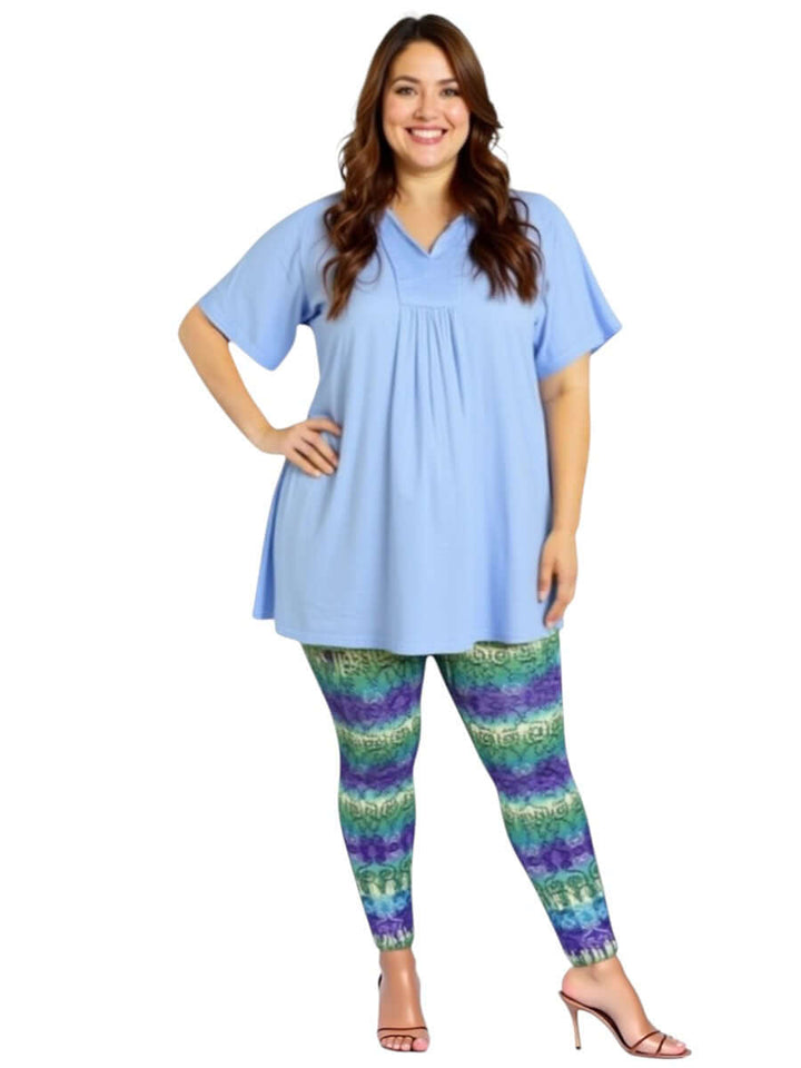 Women modeling plus size Atlas Leggings - Purple Print with a blue top, showcasing comfort and style for everyday wear.