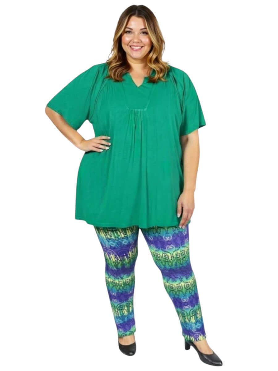 Women in green top and Atlas Leggings - Purple Print, showcasing plus size fashion for sizes 16-50 by Dale & Waters.