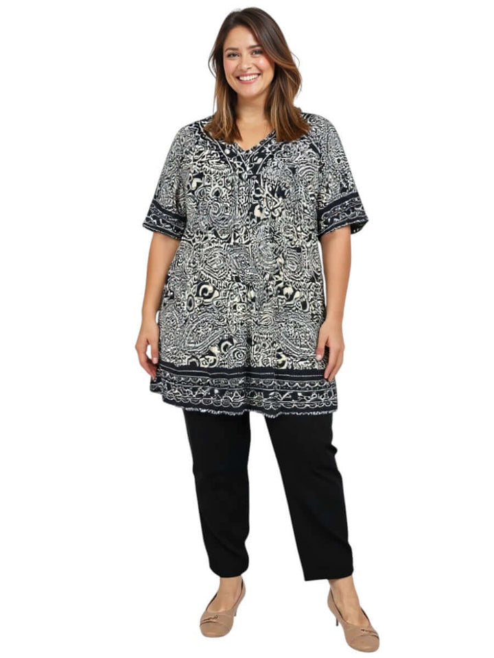 Plus size women wearing Sterling Fields Tunic - Black Print, showcasing effortless comfort and stylish design.