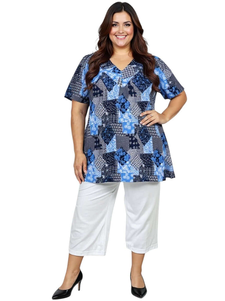 Love Is In The Air Pants - White on a plus-size woman wearing a stylish blue top, perfect for summer comfort.
