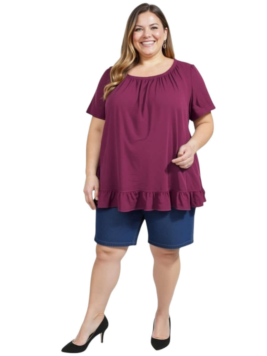 Women’s Plus Size Landra Top - Plum with flutter sleeves, styled with denim shorts, perfect for summer outings.