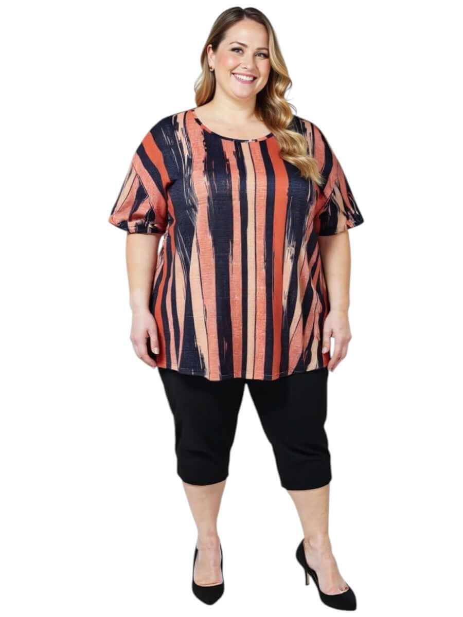 Women’s Plus Size Velma Top - Multi Print on a model showcasing effortless style and comfort in a stylish striped design.
