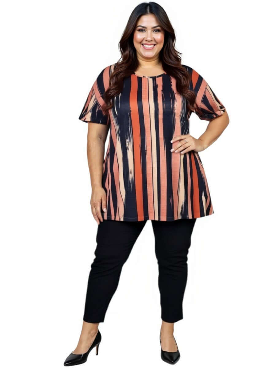 Women’s Plus Size Velma Top - Multi print on model with black pants and heels, featuring vertical stripes for a flattering silhouette.