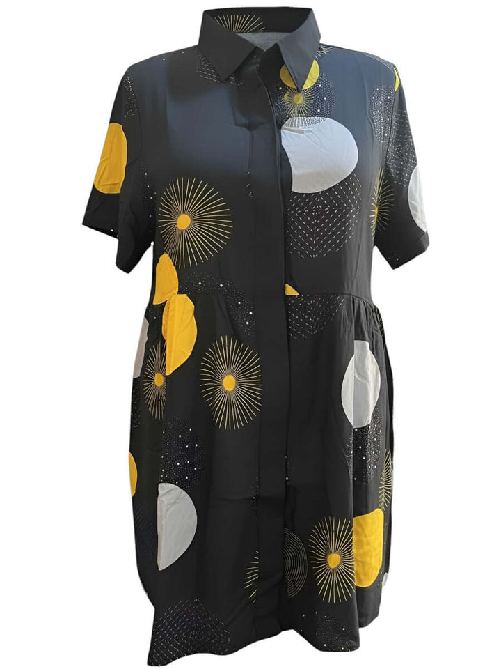 Coreen Tunic - Black Print featuring a classic collared neckline and playful print, designed for plus-size comfort.