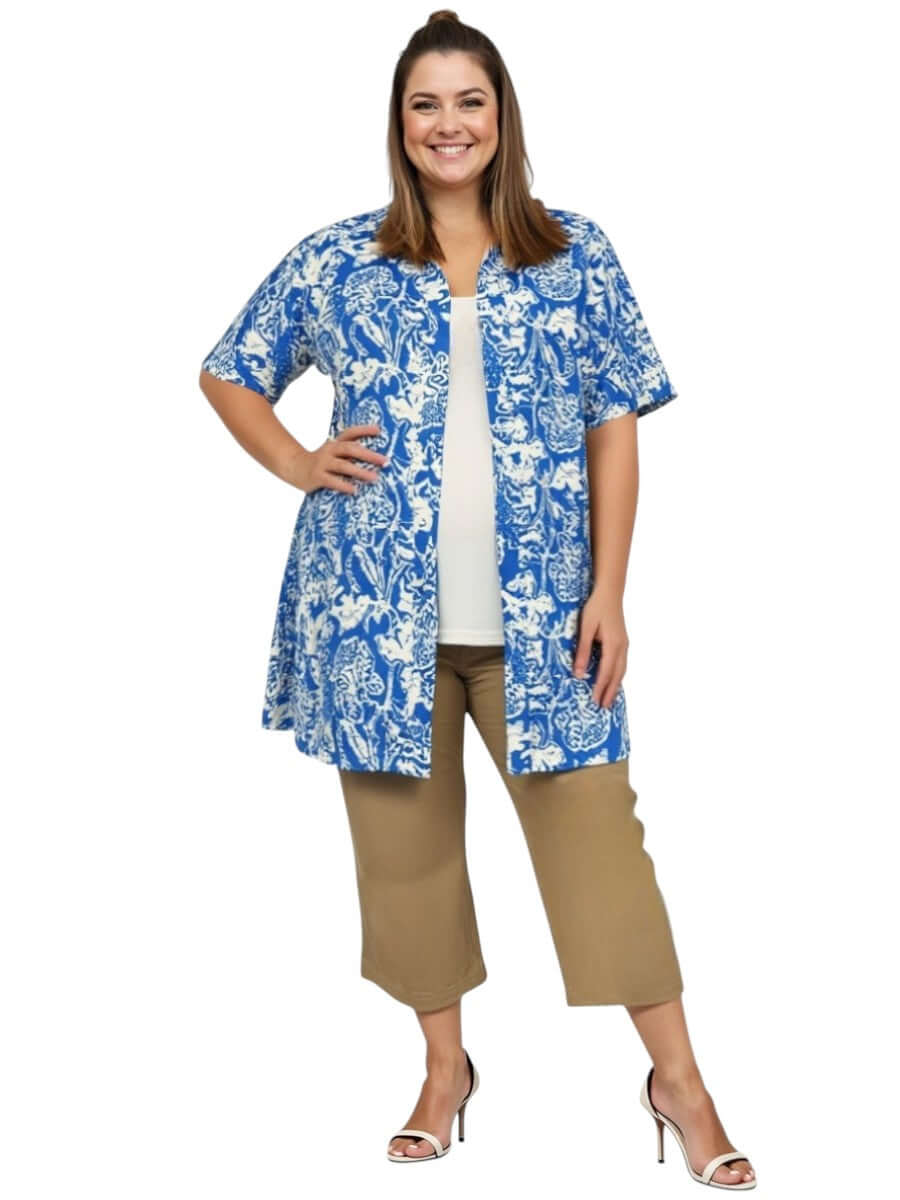 Women wearing Love Is In The Air Pants - Coco Truffle with a blue floral shirt, showcasing plus size comfort and style.