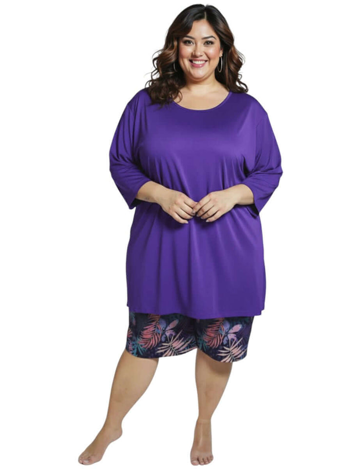 Midnight Plum Swim Rashi - Purple on plus size model wearing comfortable swimwear.