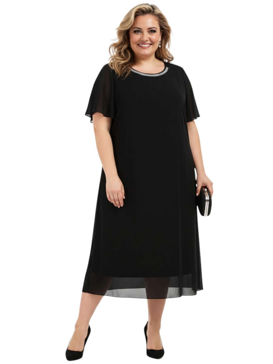 Ariel Diamanté Dress - Black model wearing elegant plus size black maxi dress with diamanté neckline, size 16-50 by Dale and Waters.