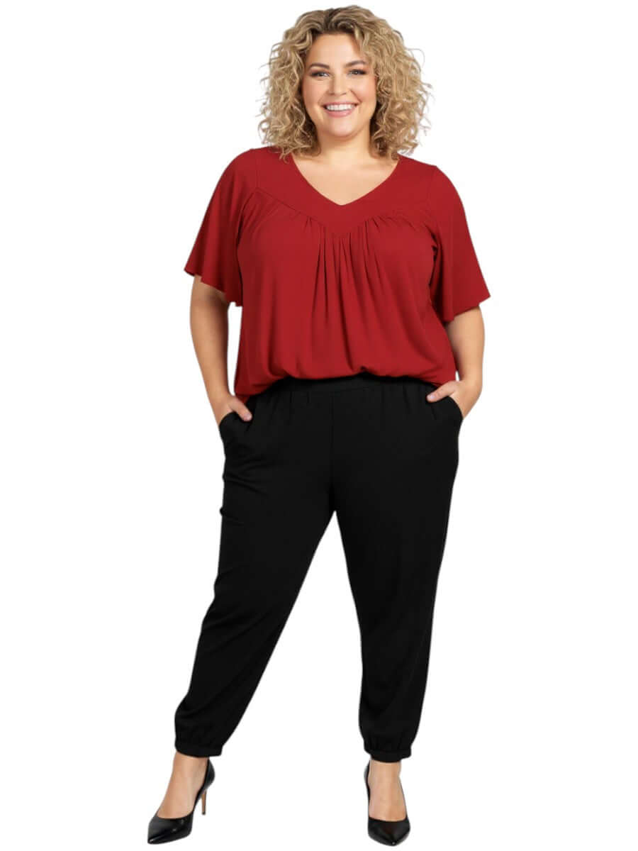 Leeman Top - Red on a plus size model, featuring elegant drape and flattering fit, designed by Dale and Waters.