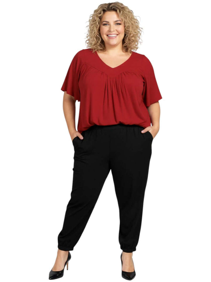 Leeman Top - Red on a plus size model, featuring elegant drape and flattering fit, designed by Dale and Waters.