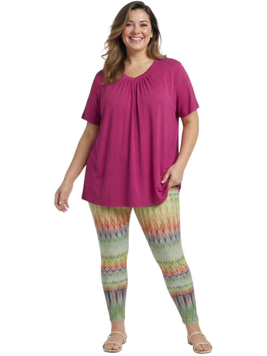 Women wearing Montez Top - Pink with colorful leggings, showcasing plus size women fashion by Dale and Waters.