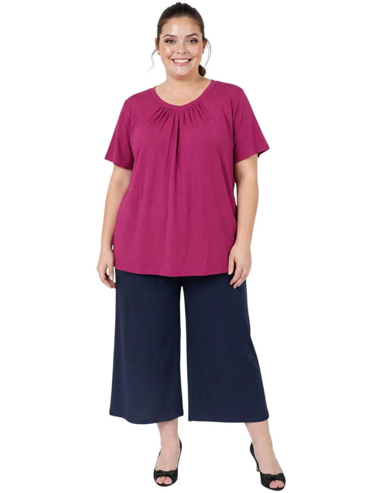 Women wearing the Montez Top - Pink, showcasing plus size women's fashion from Dale and Waters.