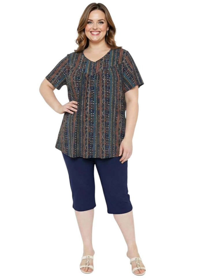 Women’s Plus Size Fernando Top - Black Print featuring vibrant geometric patterns and comfortable fit.