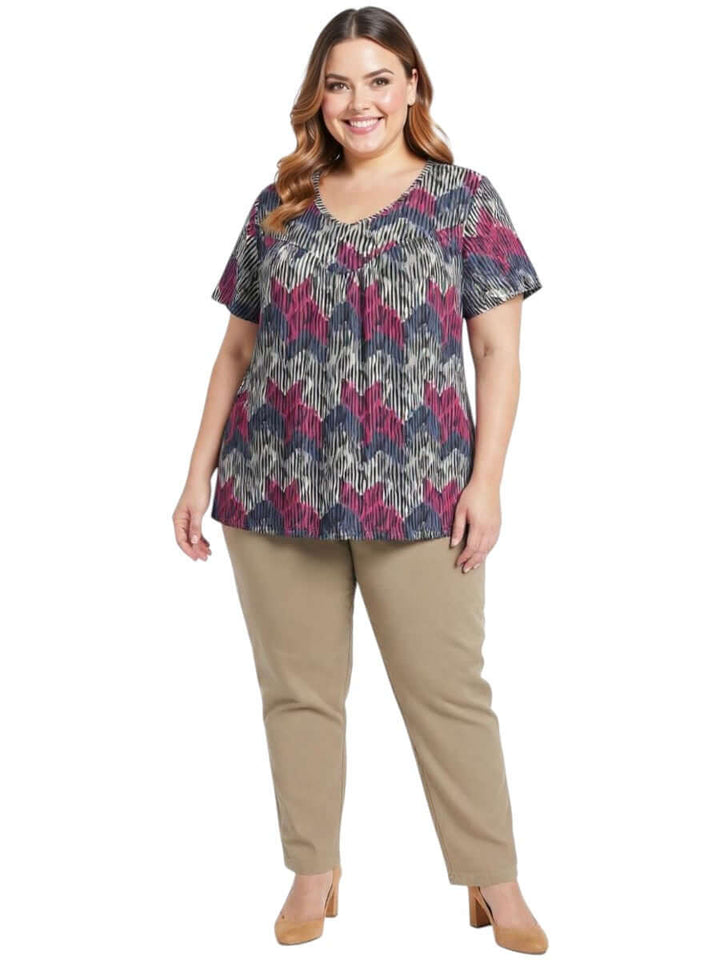 Women wearing the Fernando Top - Plum Print, featuring a vibrant chevron pattern for stylish plus size fashion.