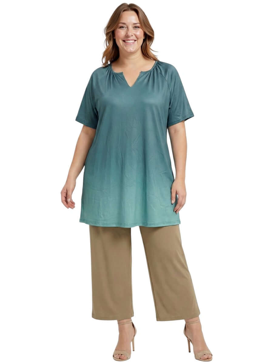 Icelynn Tunic - Teal Ombre worn by a model, showcasing a stylish gradient of teal to seafoam green.