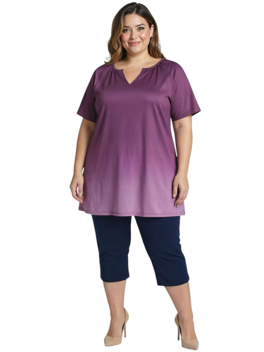 Woman wearing Icelynn Tunic - Plum Ombre showcasing plus size fashion and a modern design.