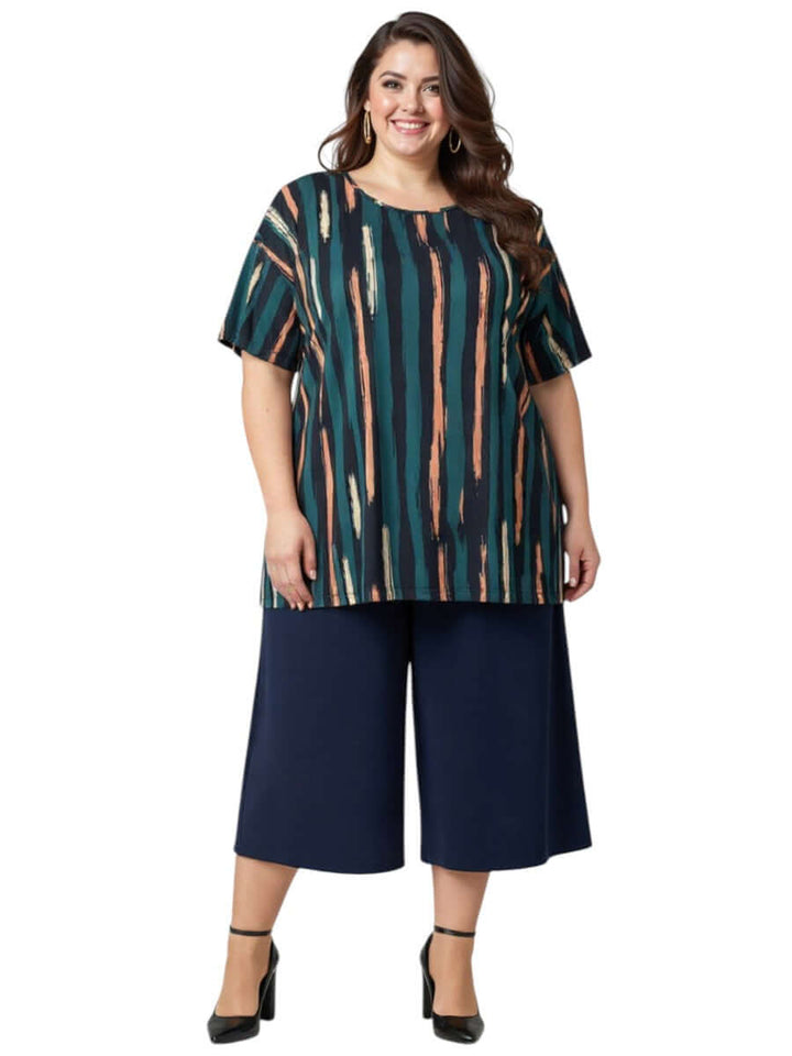 Women's Plus Size Velma Top - Green Print in a stylish brushstroke pattern, featuring deep forest green and peach accents.