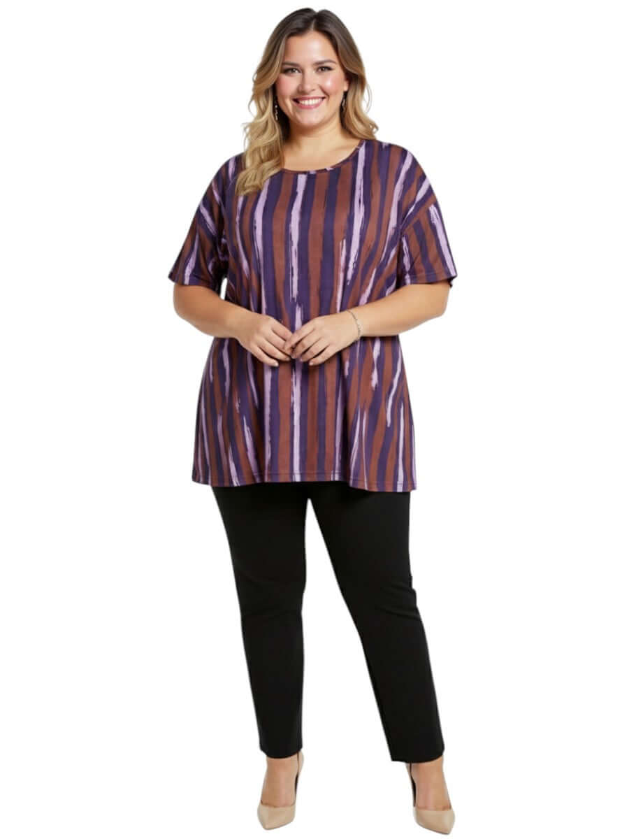 Velma Top - Purple Print on plus size model, relaxed-fit tunic with purple and brown striped pattern, women fashion.