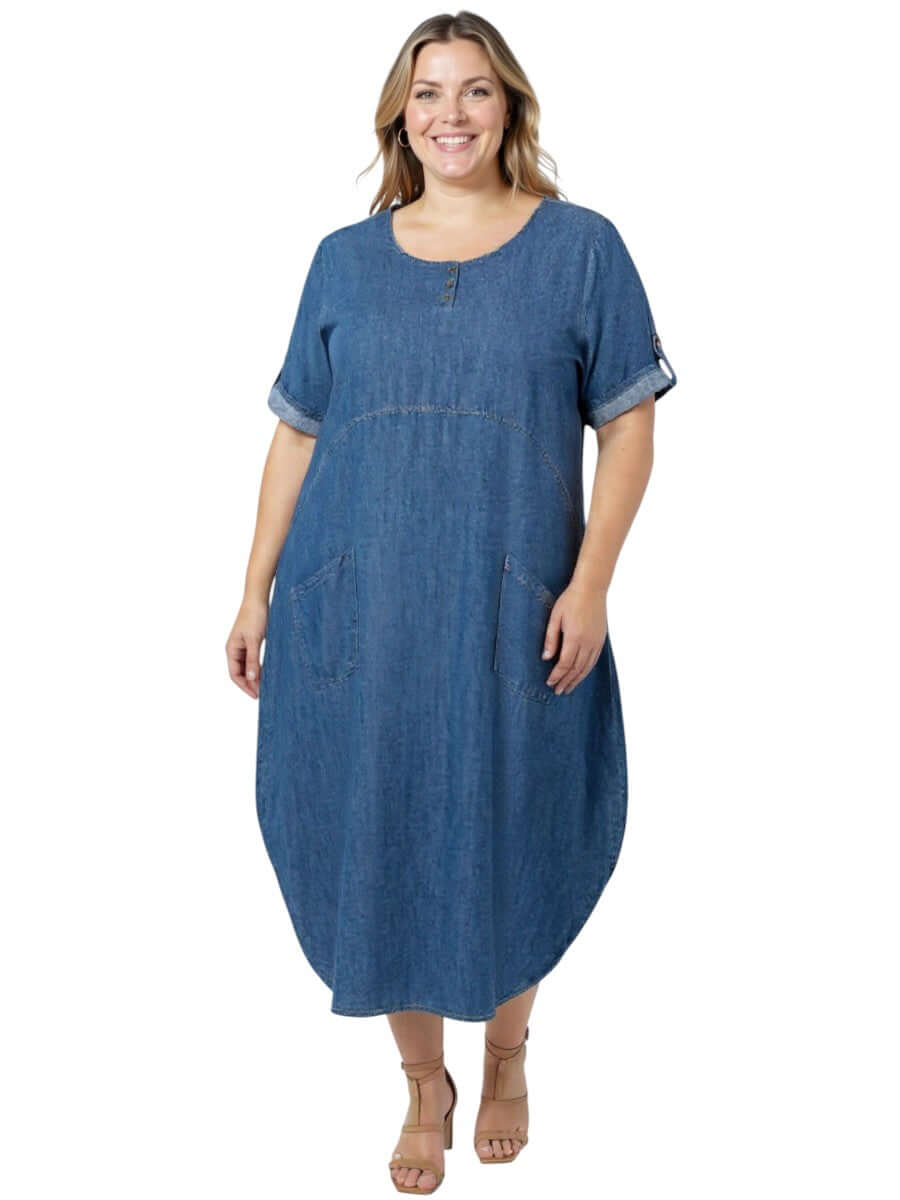 Marino Denim Tensil Dress - Tensil modeled by a plus size woman, showcasing a rich indigo wash and unique balloon silhouette.