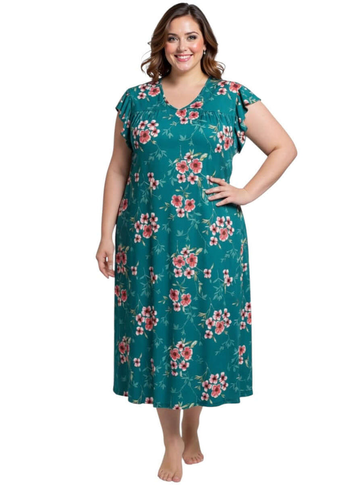 Women in plus size Electra Nightie - Green Print with floral design, showcasing comfort and style.