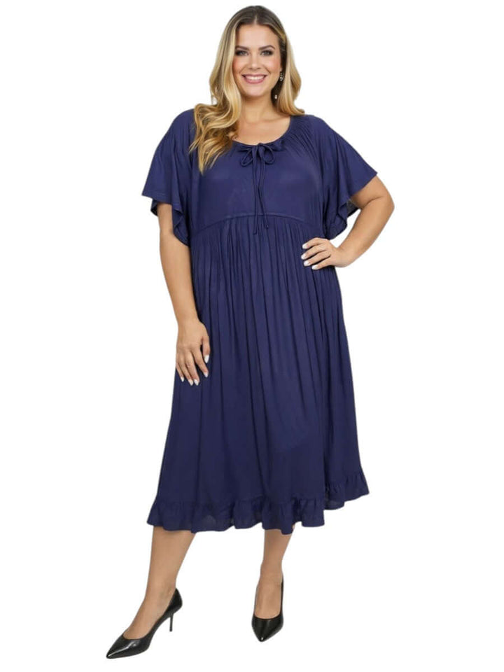 Women’s Plus Size Trinity Dress in Navy by Dale and Waters, featuring ruffle details and a flattering silhouette.