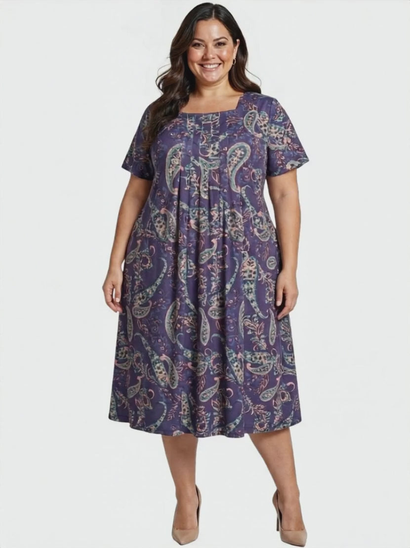 Darla Dress - Purple Print featuring a stylish paisley design, perfect for women's fashion in plus sizes.