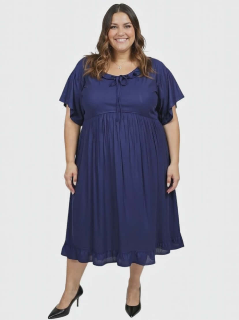 Women’s Plus Size Trinity Dress – Navy by Dale and Waters, featuring pleated ruffle and relaxed fit for a vintage style.
