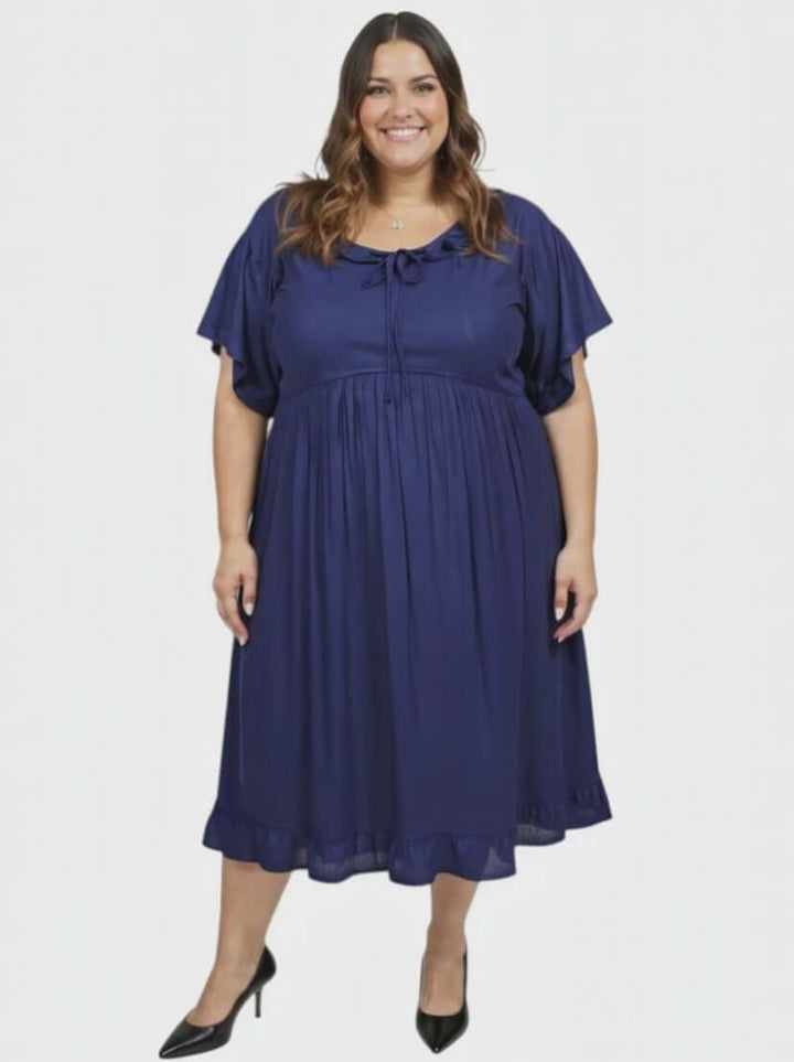 Women’s Plus Size Trinity Dress – Navy by Dale and Waters, featuring pleated ruffle and relaxed fit for a vintage style.