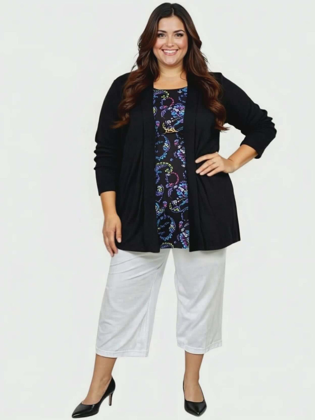 Plus size woman wearing Love Is In The Air Pants - White with a black cardigan, showcasing effortless summer style.
