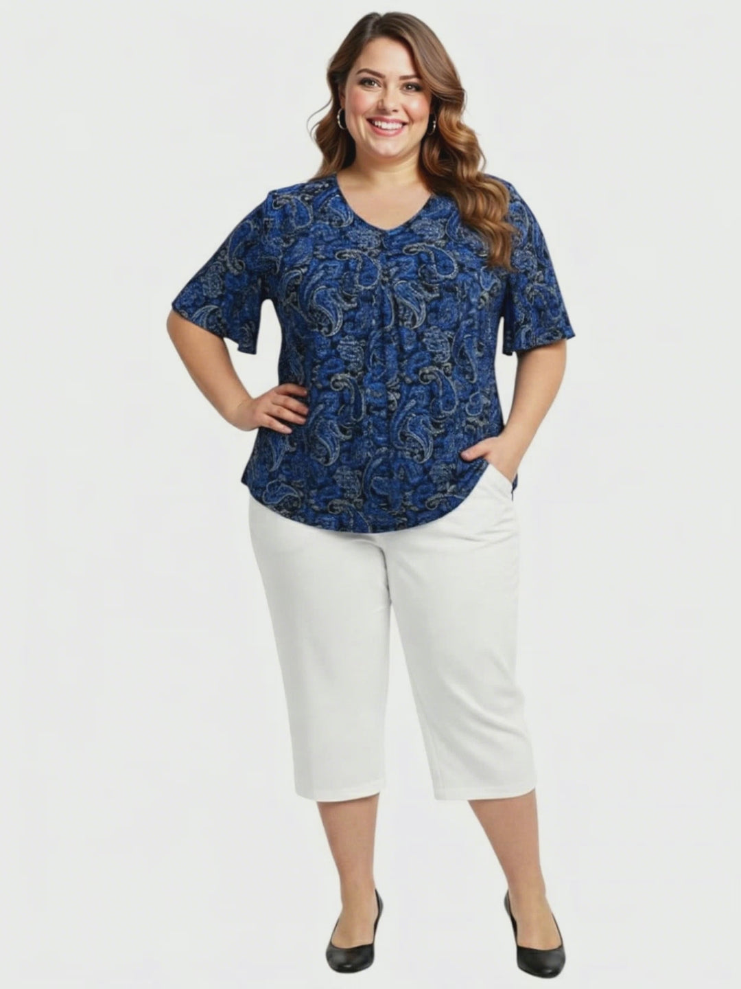 Westin Top - Blue in plus size for women, featuring a paisley print with elegant V-neckline and relaxed fit.