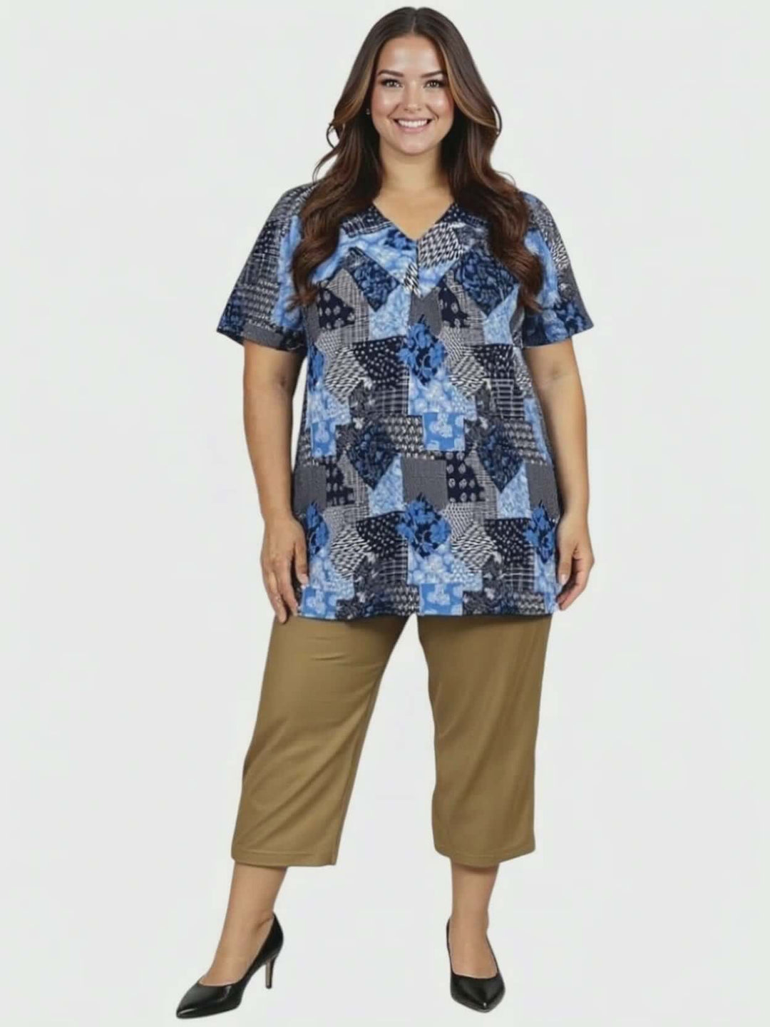 Plus size woman in Love Is In The Air Pants - Coco Truffle and patterned top, showcasing summer style and comfort.