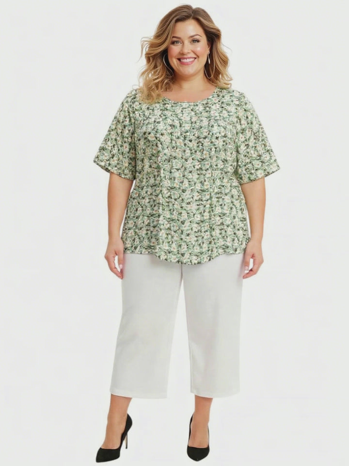 Mogan Bib Top - Green Print plus size women's top with floral design and relaxed fit by Dale and Waters in size 16-50.