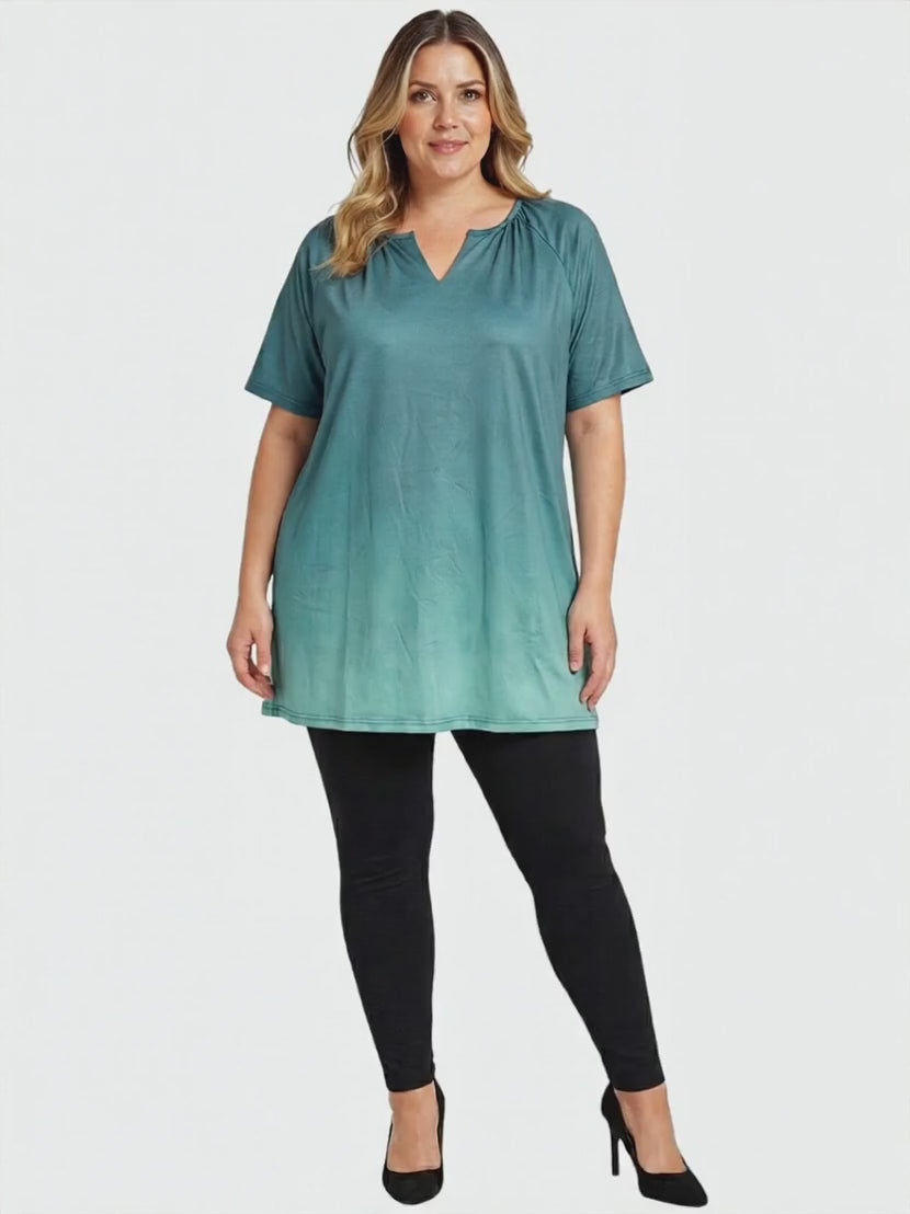 Icelynn Tunic - Teal Ombre worn by a model, showcasing its stylish gradient design for plus-size women fashion.