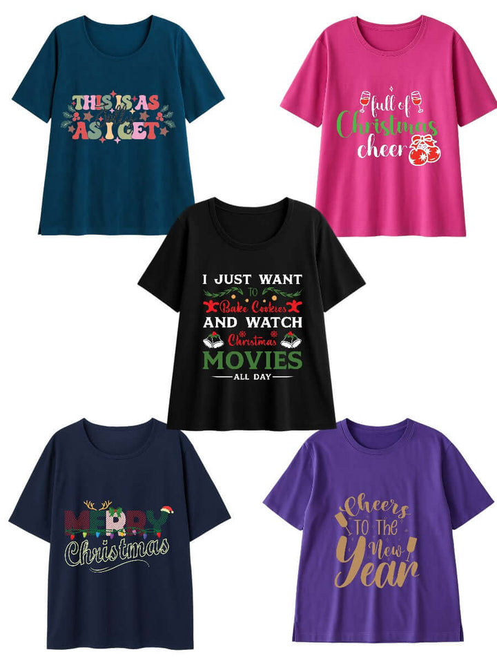 CHRISTMAS Round Neck Tees - Cotton Spandex in various colors and festive prints displayed on a clothing rack.